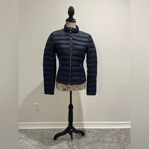 Navy blue Zara puffer.
